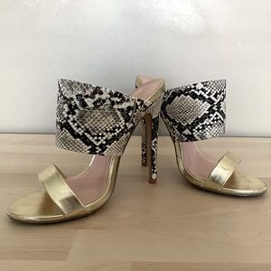 Snake skin and gold heels